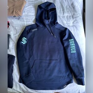 Seattle Kraken team athletic wear. Legends dri fit hoodie in mens size medium